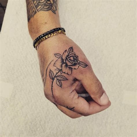 rose hand tattoo|rose hand tattoo for men.